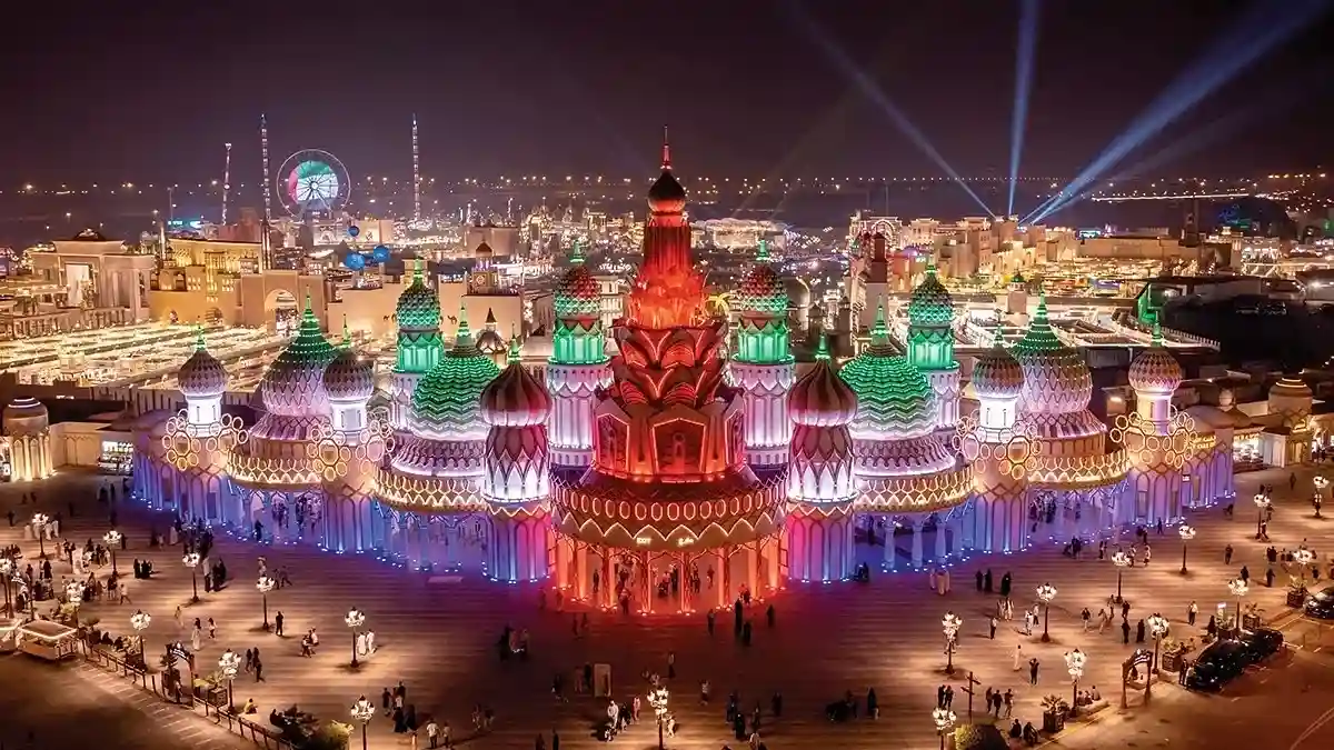 Illuminated pavilions at Global Village Dubai at night