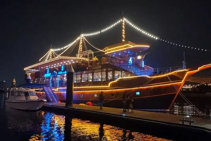Traditional Dhow boat sailing in Dubai Marina