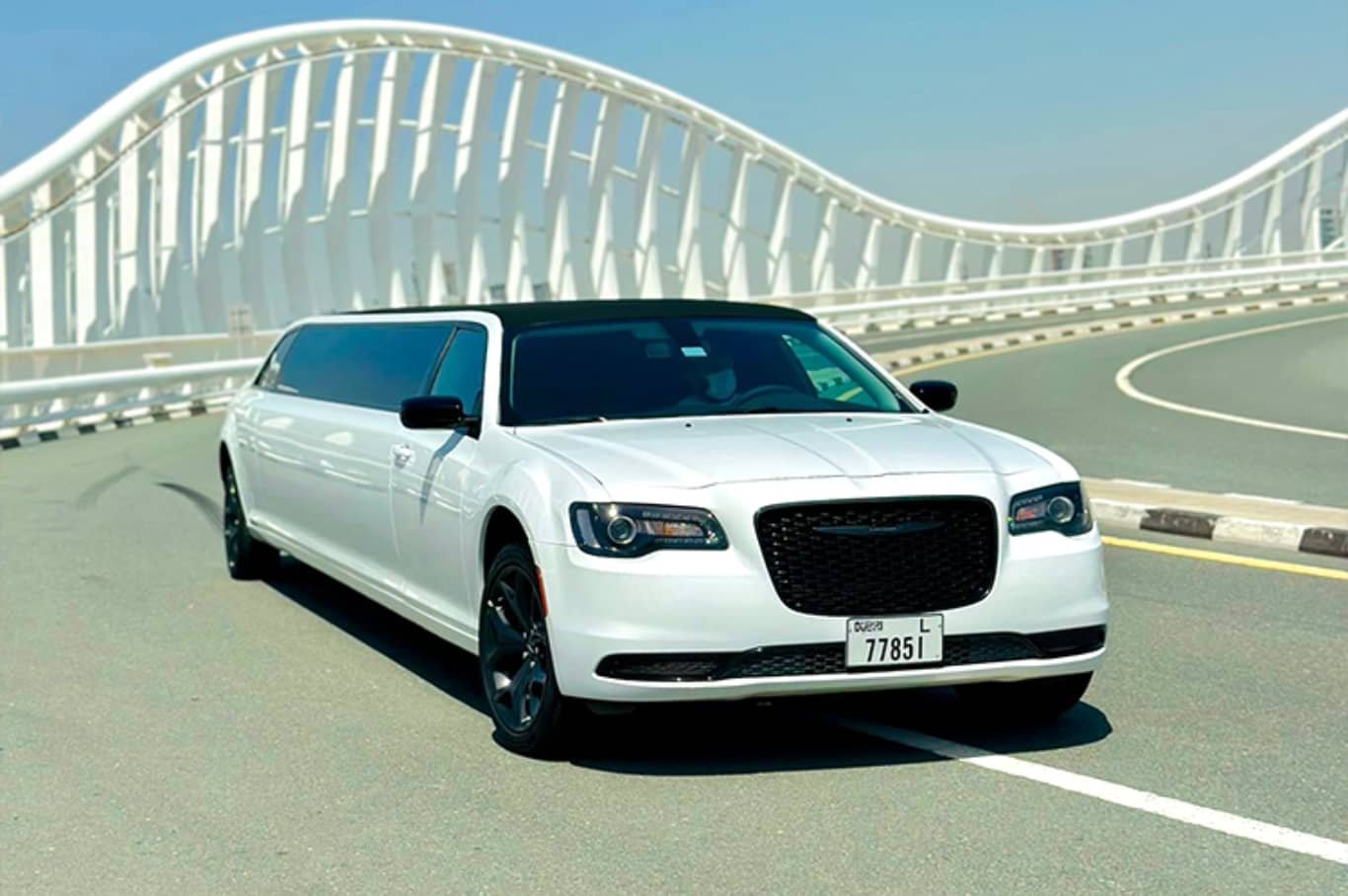 White Chrysler C300 limousine for hire in Dubai